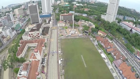 Kuala Lumpur - Malaysia - Moving Away -Master Aerial view of big green playing ground and Merdeka Square 3