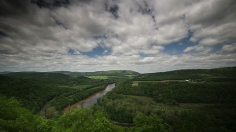 Beautiful time lapse of the view the Appalachian mountains and Potomac River of West Virginia, Pennsylvania, and Maryland as clouds float over the