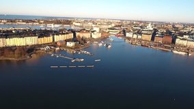 Aerial view drone video of Helsinki Baltic sea lagoon area, Helsingfors view with boats, the capital of Finland Suomi, northern Europe