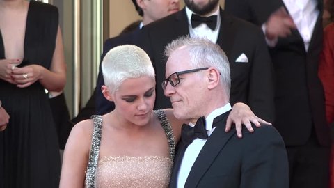 Kristen Stewart with Festival President Thierry Frémaux at the Cannes Film Festival, 5/20/2017