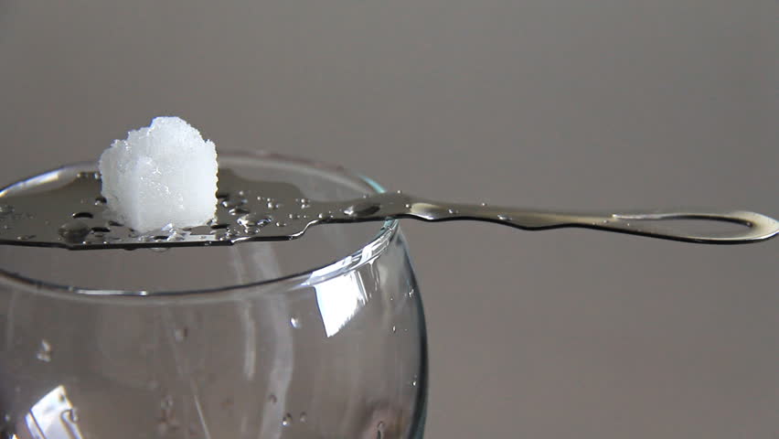 Absinthe 1. Preparing an absinthe drink. Dripping cold water through a sugar