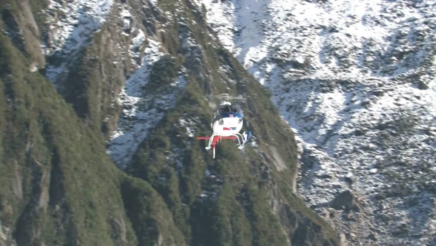 FOX GLACIER, NEW ZEALAND - CIRCA AUGUST 2011: Helicopter coming into land to
