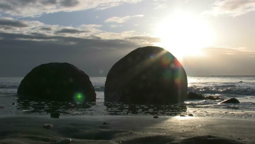 Moeraki, New Zealand. April 2012. The Moeraki Boulders are a group of large spherical “stones” or concretions that have been exposed through shoreline erosion on Koekohe Beach near Moeraki