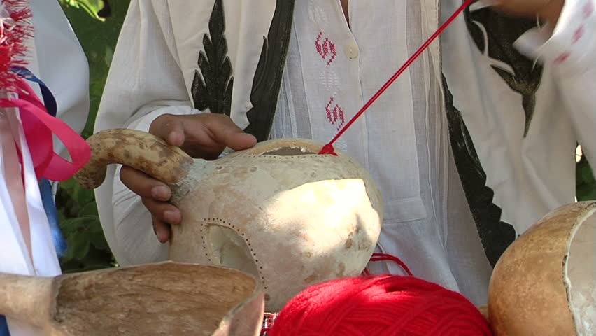 The art of making totemic masks.Making a gourd mask ... (Dobrogea region -