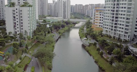 Aerial view of river walk in Singapore housing estate neighbourhood - April 2017