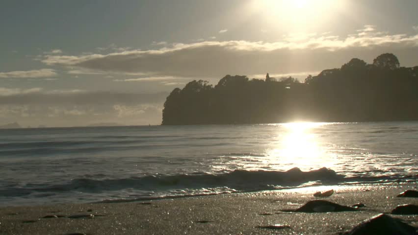 Coromandel, New Zealand. Circa April 2011.The sun just rising and shimmering on