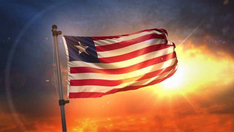 Liberia Flag Backlit At Beautiful Sunrise Loop Slow Motion 4K