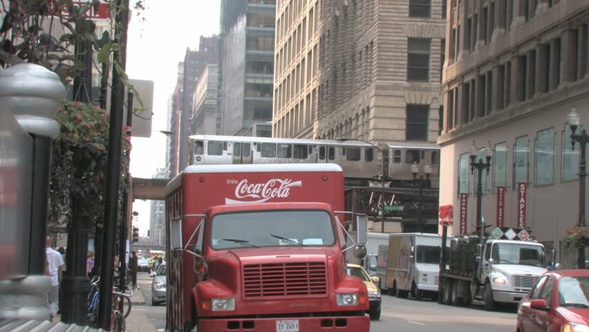 CHICAGO, USA - SEP 22, 2008: Coke Truck blocking traffic with passing cars and