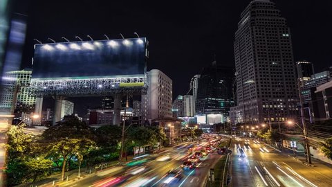 4K resolution Timelapse Cinemagraph, The Big blank billboard beside the road at night, Advertising background for add your text promotion or product in scene traffic communication
