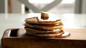 Soft pancakes with golden honey or thick syrup. Try a piece