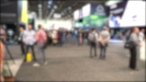 Blur background green screen chroma use of trade show convention expo booth floor.