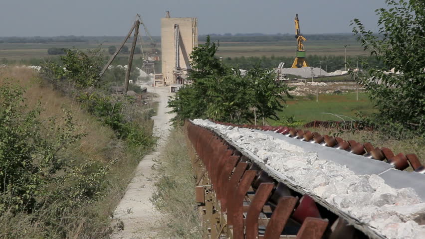 Long conveyor belt transporting stones to the manufacturing plant about 5 miles
