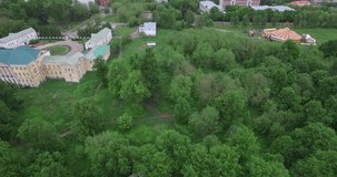 Aerial drone video with view of beautiful vintage architecture of Ivanovskoye Estate, views of main house and park in outskirts of Podolsk town in central Russia, south of Moscow