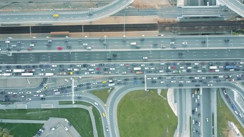 Aerial top down view of traffic jam on a car road in the rush hour. 4K video
