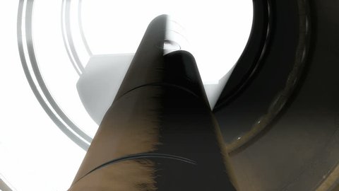 An upward view pan of an underground concrete missile silo opening up getting ready to launch an intercontinental ballistic missile 
