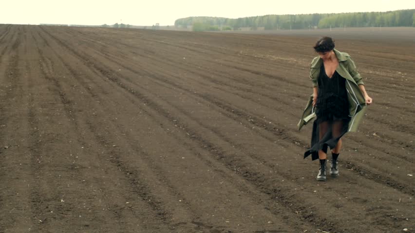 Woman walking on field
