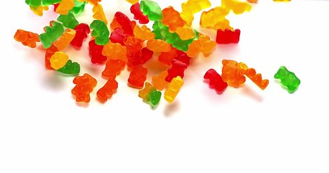 Gold Bears Gummy Bears Falling Against Stock Footage Video (100% ...