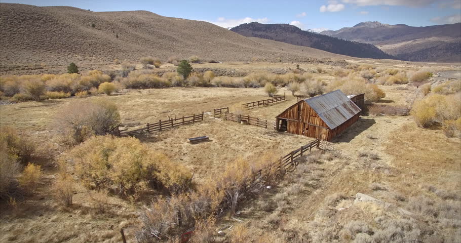 Aerial of old abandoned western barn on a ranch