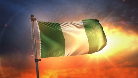 Nigeria Flag Backlit At Beautiful Sunrise Loop Slow Motion 4K