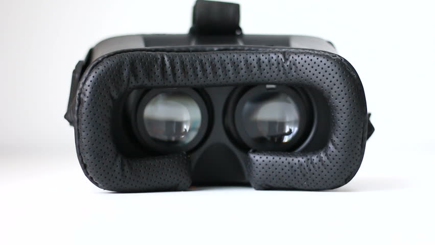 Hands of man moving virtual reality VR glases