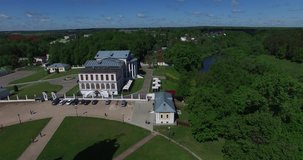 Aerial drone video with view of beautiful vintage architecture of Dubrovitsy Estate, views of The Church Of The Holy Virgin in surroundings of Podolsk town in central Russia