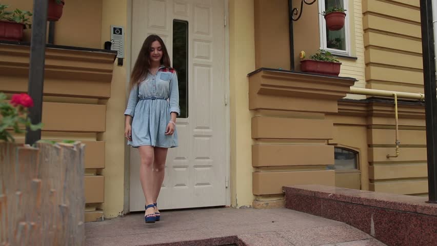 Young woman receiving bunch of flowers on a date