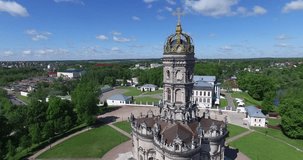 Aerial drone video with view of beautiful vintage architecture of Dubrovitsy Estate, views of The Church Of The Holy Virgin in surroundings of Podolsk town in central Russia