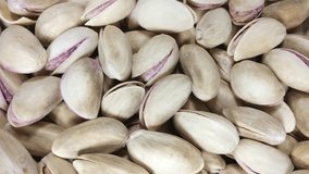 
Great background of roasted salted pistachios rotating close up. Footage will work great for any videos dealing with cooking, health nutrition, Vegetarian cuisine and much more.
