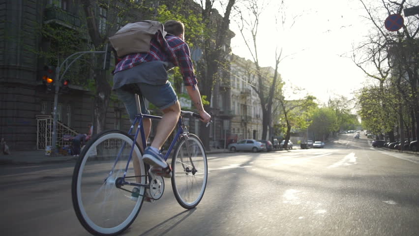 riding bike with backpack