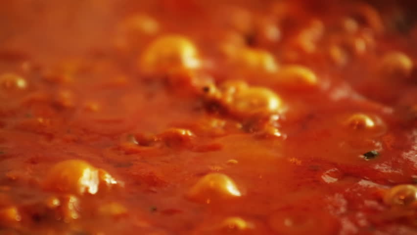 Red meat sauce boiling in the pan 
