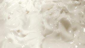 Great background of white natural, organic cosmetic cream rotating close up. Footage will work great for any videos dealing cosmetology, dermatology, anti-aging therapy and much more.