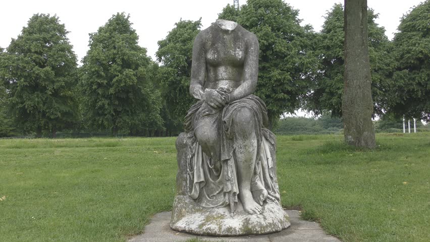 Ancient stone statue of a woman. London. 