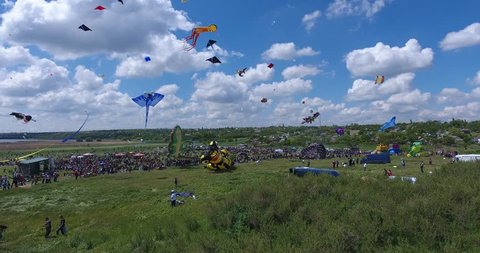 Tryhutty, Ukraine-May 21 2017: Aerial view Kites on blue background of clouds at International Kite Festival