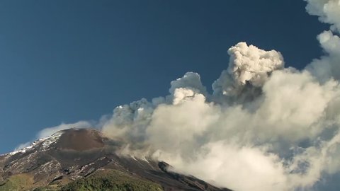 Tungurahua volcano in Ecuador, high presure gases and ash are blown into the sky