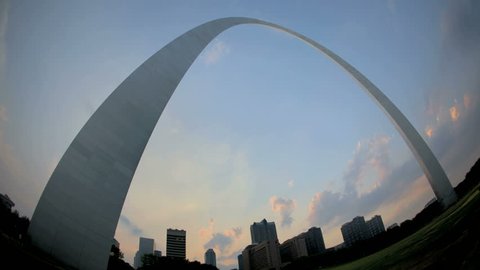 ST. LOUIS, MO, USA, JUL 07, 2011: Timelapse Fisheye-view St. Louis Arch with dramatic clouds in the background at sunset