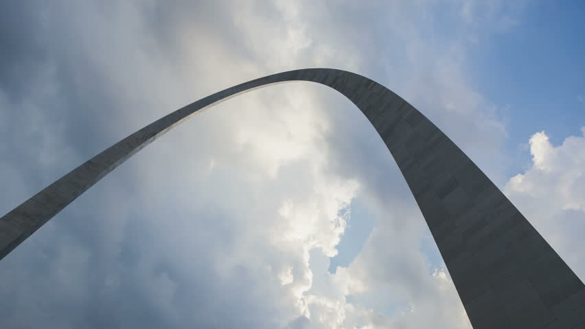 Timelapse St. Louis Arch with dramatic clouds in the background 