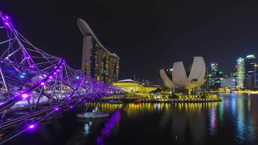 Beautiful night view timelapse of Singapore Skyline during laser and light show by the bay. 4K.