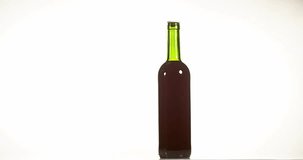 Bottle of Red Wine Breaking and Exploding against White Background, Slow motion 4K