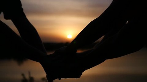 Successful, friendly, friends put their hands on their hands and toss up, expressing emotions. slowmotion. HD. 1920x1080