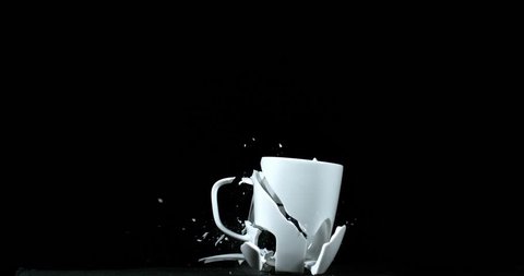Cup falling and exploding on Black Background, Slow Motion 4K