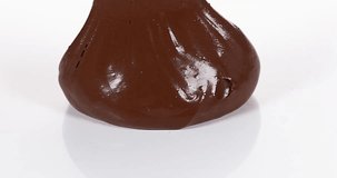 Chocolate Flowing on White Background, Slow Motion 4K
