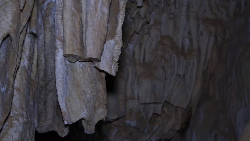 The Grotto of the White Lily, Qadisha Valley. Tilt-down shot of flowstones in the grotto. Caves here have been used as shelters since the Paleolithic.