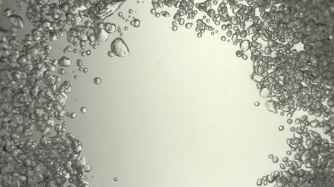 Hundreds of Bubbles Converge - Awesome background in which hundreds of tiny bubbles converge towards the center before eventually beginning to disappear one by one