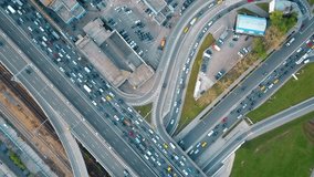 Aerial top down view of traffic jam on a city car road in the rush hour. 4K clip