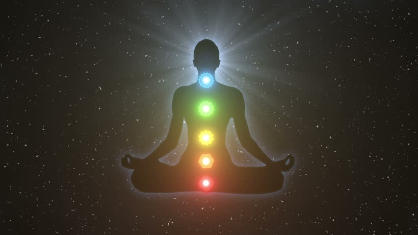 Silhouette of a person sitting in lotus yoga pose achieving nirvana or enlightenment | Unlocking Seven Chakras gaining Spiritual Awakening | Shutterstock HD Video #27375637