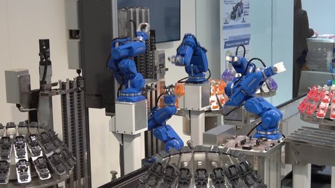 Hannover, Germany - March, 2017: Yaskawa industrial robot hands in manufacturing industry on exhibition Cebit 2017 in Hannover Messe, Germany