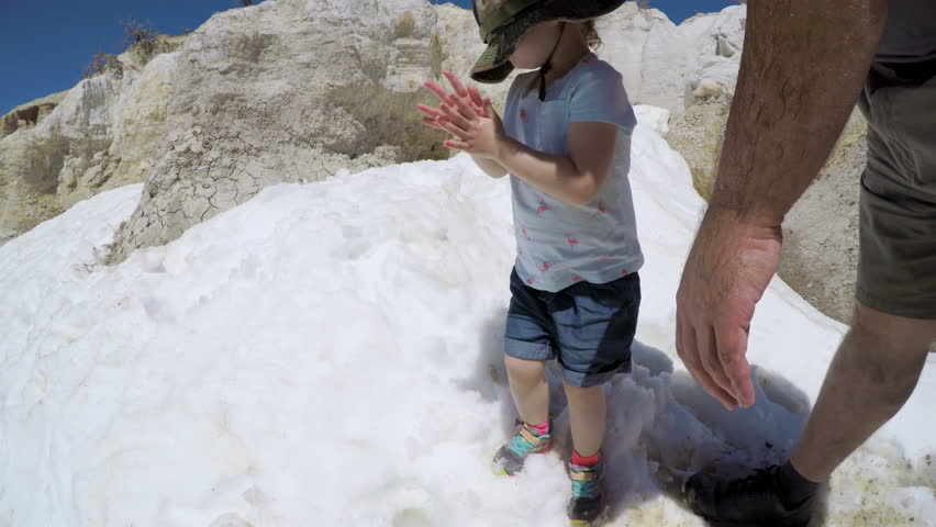 POV point of view - Little girl on a weekend hike with her dad in Paint Mines Interpretive Park in Colorado.