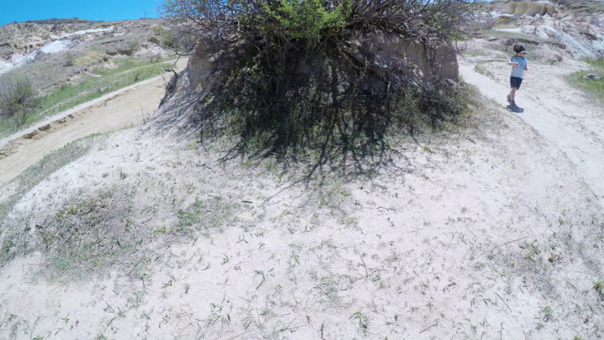 POV point of view - Little girl on a weekend hike in Paint Mines Interpretive Park in Colorado.