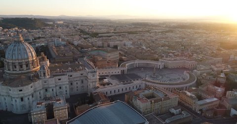 Aerial view of Rome skyline cityscape with Vatican City landmark at sunrise