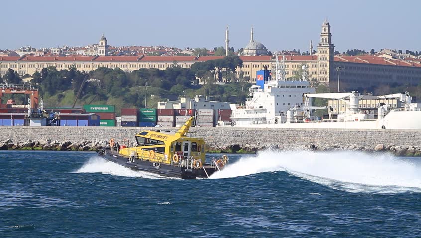 ISTANBUL - APRIL 28: Coast guard boat KIYI EMNIYETI maneuvering in front of
